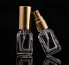 Partihandel 5 ml glas parfymflaska mini reseficka tomma parfym provflaskor med svarta guld silver lock