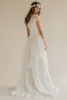 Bohemian 2019 Ny sommarstrand Bröllopsklänningar Boho Lace Scoop Short Sleeve Tiered Long Bridal Gowns Custom Made China 1189