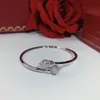 Double tête de léopard Personnalité dominatrice Bracelet femme Argent chaud Livraison gratuite Simplicité Bracelet de danse Offrir des cadeaux Bracelet léopard