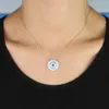 Collana con ciondolo a catena Forma rotonda geometrica pavimentata 5A Cubic Zirconia Arcobaleno Cz Eye Gioielli turchi fortunati da donna