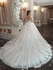 Splendidi abiti da sposa con maniche lunghe da ballo 2020 Arabo trasparente con scollo gioiello Illusion con bottoni sul retro Abiti da sposa in pizzo ricamato AL4171