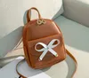 Mini mochila para mujer, mochila a la moda con hombros pequeños, mochila con letras, monedero, mochila de mensajero para teléfono móvil, mochila femenina