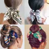 scrunchies del pelo de la perla