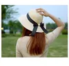 折りたたみ式女性ワイドブリム帽子弓リボンバケツ帽子麦わら帽子帽子サンハット夏のトピックサンキャップ送料無料