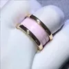 Koreaanse keramische man en vrouw roze ring hoogwaardige luxe sieraden ontwerper roestvrij staal 2020 nieuw cadeau paar ring hele PE1485452