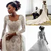 2019 Crystals Africano mangas compridas Lace Mermaid vestidos de casamento do pescoço da colher Lace Applique frisada sobre saias Tribunal Trem do casamento vestidos de noiva