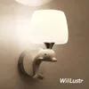 Creative Resin Dolphin Wall Lamp Mjölk Vitglas Sconce Hotel Cafe Bakery Aisle Vardagsrum Bedside Single Dubbel Huvudbelysning