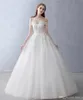 High-Quality Rice White Shoulder Drag Wedding Dresses Strapless Lace Autumn And Winter Lace Decals Beaded Pompon Church Dresses DH149