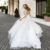 Nuovi abiti da sposa Boho Gioiello Collo Maniche lunghe Appliqued Pizzo Elegan Abito da sposa Beach Sweep Train Custom Made Cheap Robes De Mari￩e