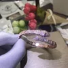 ブランドのハイエンドの蛇の形の新しいマルチセクションフルダイヤモンドカップルバングル弾性ライブファッションカップルブレスレット花嫁の宝石類のためのブレスレット