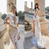 Mermaid Wedding Dresses 2020 Sheer Long Sleeves High Collar Illusion Lace Applique Side Slit Boho Wedding Dress Bridal Gown robes de mariée