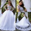 2019 Elegant Lace A Line Wedding Dresses Sheer Long Sleeves Tulle Lace Applique Sweep Train Wedding Bridal Gowns With Buttons