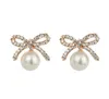 Fashion exquisite zircon bow pearl Stud earrings highgrade 18K goldplated hypoallergenic female cute girl earrings9125697