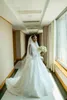 Urocze afrykańskie sukienki ślubne w szyku w szyku w szyku w szyku w szyku V-Neck Applique A-line 2022 Tiuls Plus Size Country Stude de Mariée Bridal Suknia dla Bride Custom