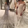 New Sexy Mermaid Wedding Dresses Sheer Neckline Lace Appliques Pearls Beaded Illusion Long Sleeves See Through Tulle Plus Size Bridal Gowns