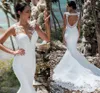 2020 Sexy Mermaid Wedding Dress Sleeveless Lace Appliqued Illusion Back Boho Wedding Gown Long Train Bride Dress