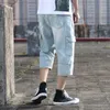 Летний новый стиль мужчины с отверстиями Capri брюки корейский стиль Trend свободные прямые мужские ковбойские короткие штаны плюс-размером