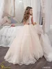 Nya Barn Gilrs Ball Gown Dresses Lace Applique Juvel Neck Tulle Bow Knot Sashes First Holy Communion Dress for Wedding