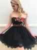 Bescheiden strapless kant homecoming jurken plus size nest zwart jurk partij prom mouwloze Arabische knielengte cocktail afstuderen club slijtage