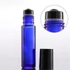 Şişeleri üzerinde Toptan Kalın 10ml Cam Rulo Siyah Kapaklar Ücretsiz Kargo 1000pcs / lot ile Amber Mavi Şeffaf Boş makara top parfüm şişeleri