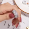 925 Silver Pave Setting Full Cushion Cut Simulerad Diamond CZ Eternity Band Engagement Bröllop Sten Ringar Storlek 5,6,7,8,9,10