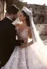 2023 Arabische Kristall Brautkleider Tüllkugel Kleid schiere Langarmstrand Brautkleider Kapelle Zug Mitte gemacht