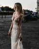 2021 Abiti da sposa a sirena Scollo a V Maniche lunghe Appliques in pizzo Abiti da sposa Custom Made Backless Sweep Train Beach Robe De Soiree