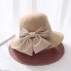 Groothandel-l hoge hoed herfst en winter nieuwe effen kleur grote boog wastafel hoed hoge kwaliteit vilten dames koepel mode hoed