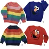 子供の衣装の子供虹の縞模様のセーターベイビーセサミエルモスウェットシャツストライプ編みプルオーバー暖かいウールトップスcloiti5173253