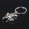 24 st / lot Flygplan Nyckelring Ringflygbolag Passagerarfartyg Airbus Modell Smycken Metallväska CHARM Fashion KeyRing Acessories