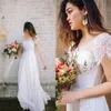 Boho New Vintage Cap Short Sleeves Spets Chiffon Beach Wedding Dresses Backless Bridal Gown Celebrity Vestido de Noiva Robe de Mariee