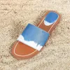 Nowy luksusowy designerki Slipper Sandals Lady Fashion Classic alfabetyczny wzór zwykły piaszczysty klapki płaski rozmiar 34-42