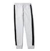 Pantalones deportivos de lujo para hombre, pantalones deportivos con cordón de marca, alta moda, colores blancos y negros, diseño de rayas laterales, Joggers216S