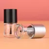 1 pc 10 ml nagellakfles met borstelnavulbare lege lege cosmetische container glazen fles nagel kunst manicure gereedschap zwart zilveren caps5633040