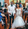 Ny ankomst Sexiga sjöjungfru Bröllopsklänningar Spaghetti Straps Lace Appliques Pärlor Crystal BacklesflesTulle Sweep Train African Bridal Gowns