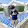 Kids Cotton Plaid Plaid Plaid Summer Children New Lapel Pliad Short Sleeve Tops Boys and Girls Cotton Tshirt Navy White A016068638158