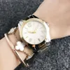 Orologio da polso di marca di moda per orologi da donna al quarzo con cinturino in metallo stile ragazza TOM 03