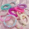 12Styles Laser Telephone Wire Cord Gum Hair Tie Girls Elastic Hair Band Ring Rope Transparent laser Bracelet Stretchy Hair Ropes G6293217