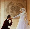 2019 Арабские мусульманские длинные рукава с кружевными оболочками Свадебные платья Исламский хиджаб Свадебные платья с высоким вырезом и аппликацией Свадебные платья с длинными 2384803