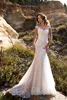 Abiti da sposa eleganti in pizzo bianco a sirena maniche ad aletta trasparenti Sweep Train Abiti da sposa da sposa con bottoni Vestidos De Soiree