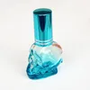 8ml Mini Vuoto portatile da viaggio Bottiglie riutilizzabili Forma di teschio Bottiglie di profumo di vetro colorato Bottiglie di profumo campione 7 colori Spedizione gratuita