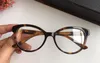 Lujo-Nuevas gafas ópticas de diseñador para mujer 8184 Gafas con marco de lente transparente de ojo de gato Gafas con incrustaciones de diamante Estilo elegante Vienen con estuche