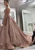 Nowy Projektant Róża Złoty Sparkly Sexy Africal Prom Dresses Zroszony Kryształy Backless Cekinowa długość podłogi Sukienka Wieczór Nosić Formalna sukienka