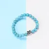 Nyaste natursten silverfärg uggla turkos armband för kvinnor trendiga 8mm blå pärlor elastisk vänskap armband strand smycken