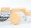Frosted Glass Jar Cream Butelki Okrągłe Słoiki Kosmetyczne Ręcznie Twarz Pakowanie Butelki 5g 10g 15G 30g 50g Słoiki z drewnianą pokrywą