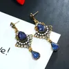 Boucles d'oreilles en gros pour les femmes rouge bleu pierres précieuses lustre boucle d'oreille vente chaude bohème style de vacances cristal rubis bijoux cadeaux d'anniversaire