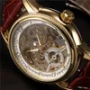 男性の手首は豪華なゴールデンスケルトンメカニカルスチームパンク男性時計自動腕時計レザーストラップヘレンホーログJ190702470