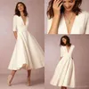 2019 Nouveau BHLDN Nouvelle Mode Thé Longueur Robes De Mariée Vintage Avec Demi Manches Col En V Personnalisé Faire Court Beach Party Robe De Mariée De Mariée