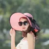 Женщина Стро Бич ВС Hat Summer Casual Широкий Брим Solid Складной Hat Lady Floppy Bowknot ленты Пляж Cap TTA-1036