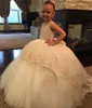 Robe de princesse magnifique avec Bow Pearls Appliques robe de fille de fleur pour mariage robes de bal Backless Occasion spéciale pour 2-13Y